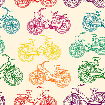Seamless pattern with outline colorful rainbow vintage bicycles 