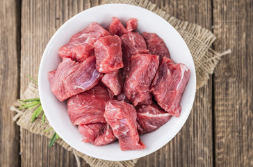 Wooden table with Chopped Beef fillet