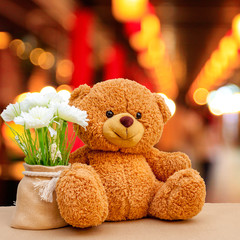 Nice and cute teddy bear with blured background