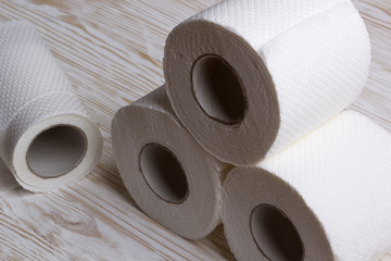 Toilet paper on wooden board