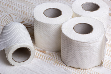 Toilet paper on wooden board