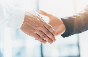 Business partnership meeting. Photo businessmans handshake. Successful businessmen handshaking...