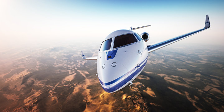 Closeup. Realistic image of White Luxury generic design private jet flying over the mountains. Empty blue sky with sun at background. Business Travel Concept. Horizontal. 3d rendering