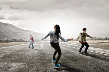 Young people riding skateboard