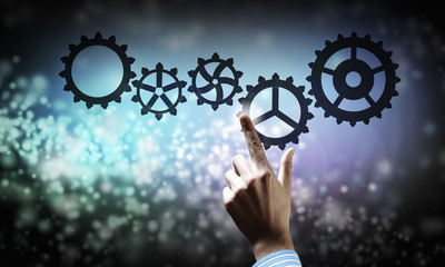 Cogwheel mechanism as teamwork concept