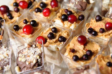 Delicious sweet buffet with cupcakes. Sweet holiday buffet with