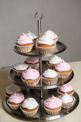 Delicious sweet buffet with cupcakes. Sweet holiday buffet with