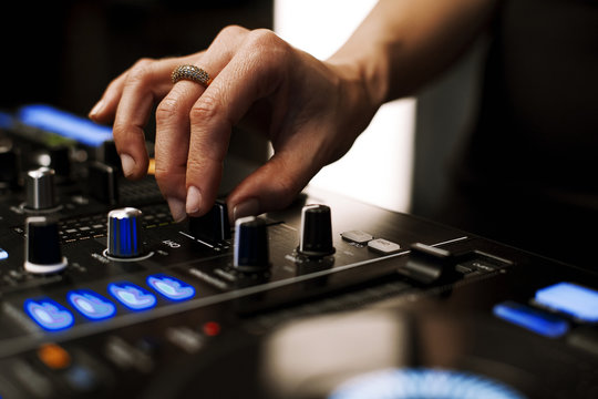 Close-up of hands in a mixer