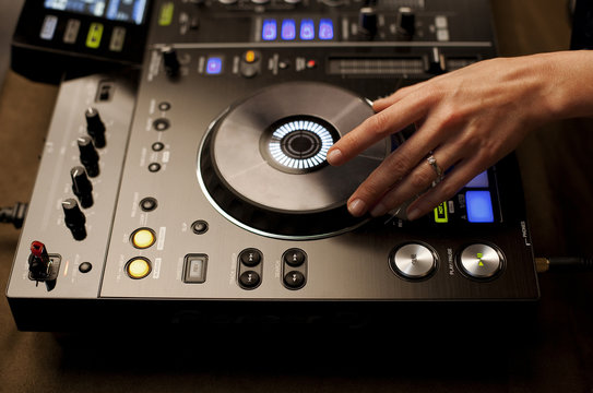 Close-up of hands in a mixer