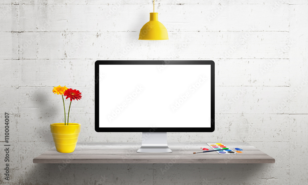 Poster computer with isolated screen for mockup on office desk.