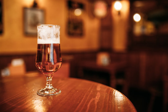 Closeup of a pitcher of beer in a pub