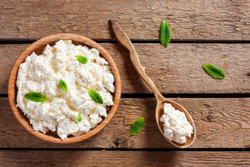 cottage cheese in a wooden bowl