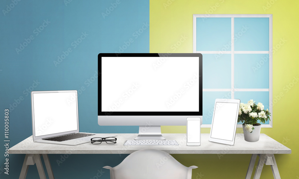 Aufkleber Responsive devices on desk with isolated screen for mockup. Computer display, laptop, tablet and smart phone. 