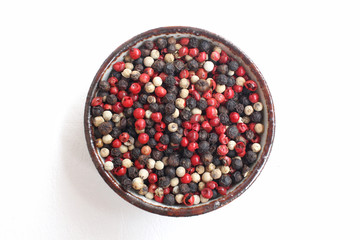 Spice of colored peppers ball isolated