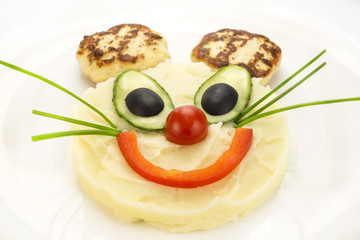 mashed potatoes in a mouse with ears of the chops