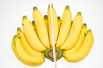  banana  with measure tape on white background