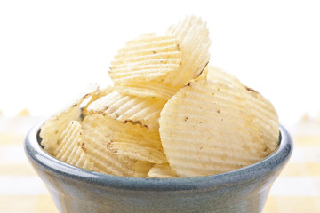 potato chips in blue bowl