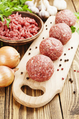 Raw meatballs on the table