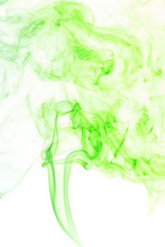 Abstract green smoke from aromatic sticks.