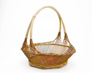 Obraz premium Empty wicker basket isolated on white