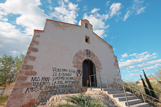 Little chapel with loutish graffiti