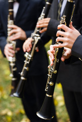 group of musicians playing the clarinet.