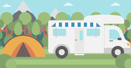 Background of motorhome and tent in the forest.