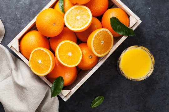 Fresh orange fruits and juice
