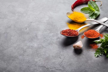 Gordijnen Colorful spices and herbs © karandaev