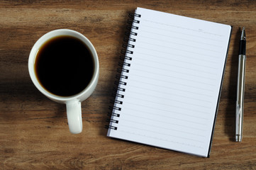 Obraz na płótnie Canvas Smart phone, coffee, pen and notepad with text 