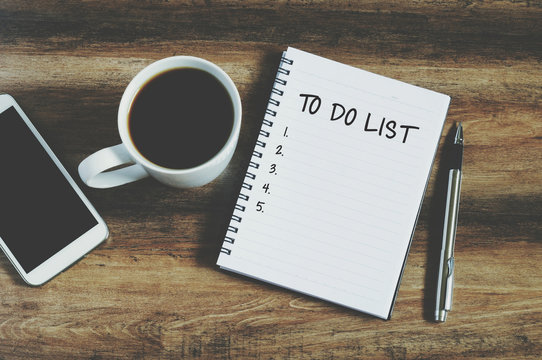 Smart phone, coffee, pen and notepad with text " to do list", retro style