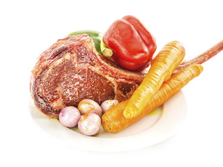 Raw seasoned rib eye steak