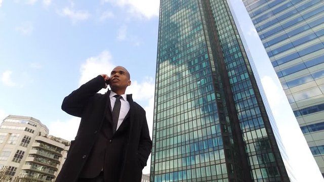 Black businessman in La Defense district, Paris, France