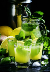 Lemonade with kiwi, green basil, grapefruit syrup and ice, black