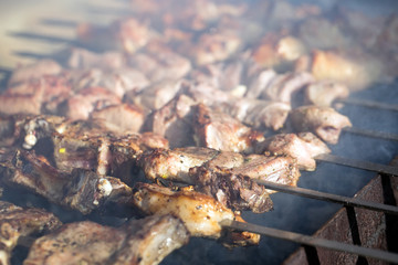 Cooking meat on the fire.