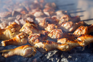 Cooking meat on the fire.