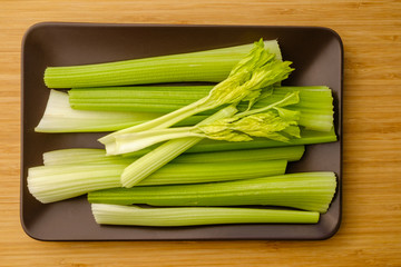 Celery stalks. On a platter.