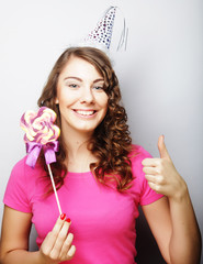 Beautiful party woman model with  lollipop