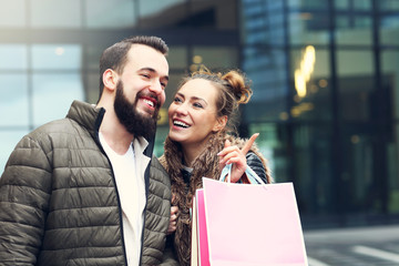 Young couple shopping in the city