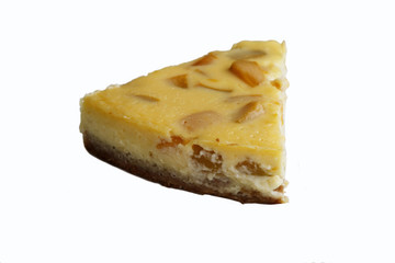 A Slice of Peach Cheesecake with a white background