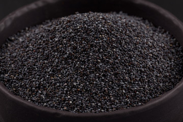 poppy seeds in a stone bowl