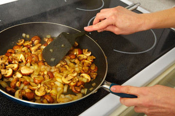Fried mushrooms in a frying pan