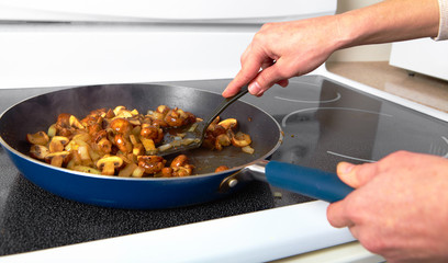 Fried mushrooms in a frying pan
