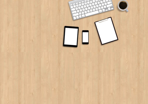 Office table top view mock up image with smart devices. Wooden background
