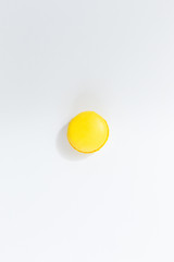 French colorful macarons on white background