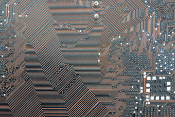brown electronics background of computer mainboard.