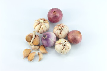 Studio shot of organic garlic and shallots assortment