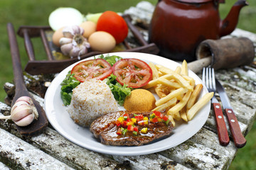 Rice with potatoes and meat.