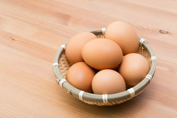 Fresh eggs in basket