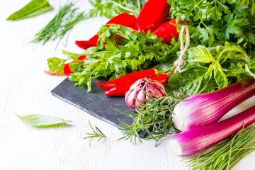 Fresh herbs, vegetables and seasoning. healthy food concept